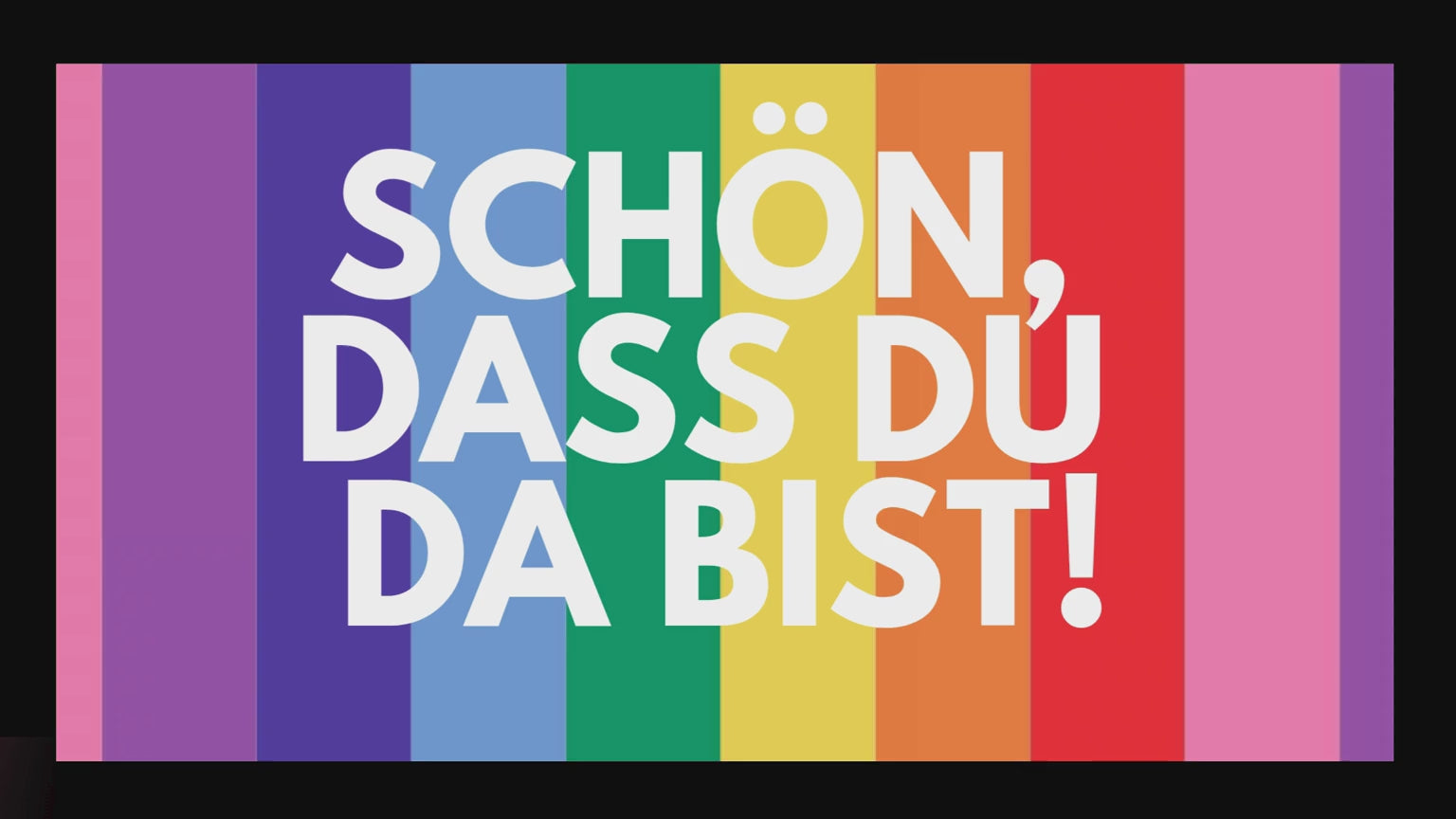 Video laden: Schriftzug, schön dass du da bist auf einem Regenbogenhintergrund, der sich bewegt.